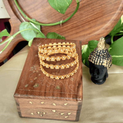 Flower Design Pearl Bangles