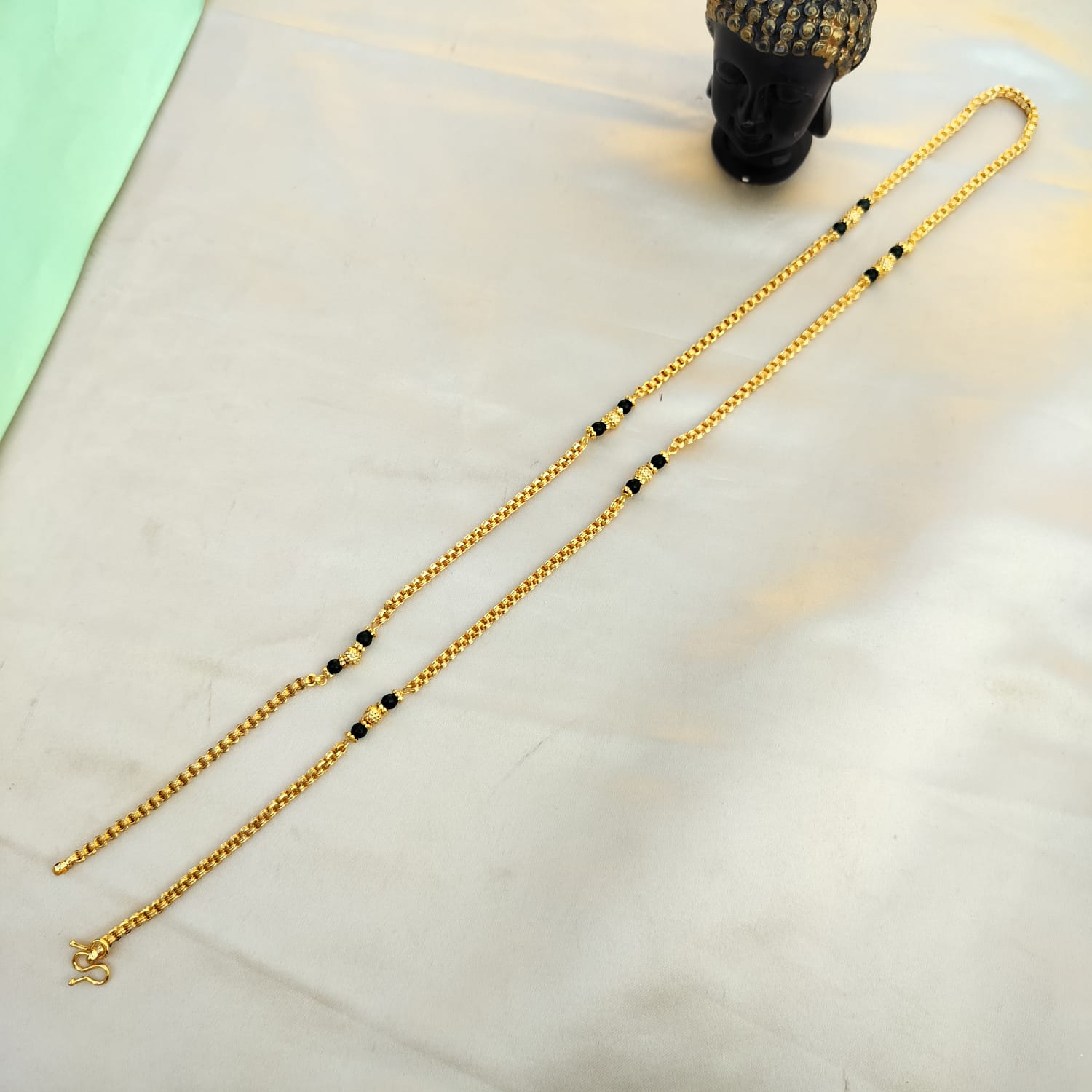 Green beaded chain 